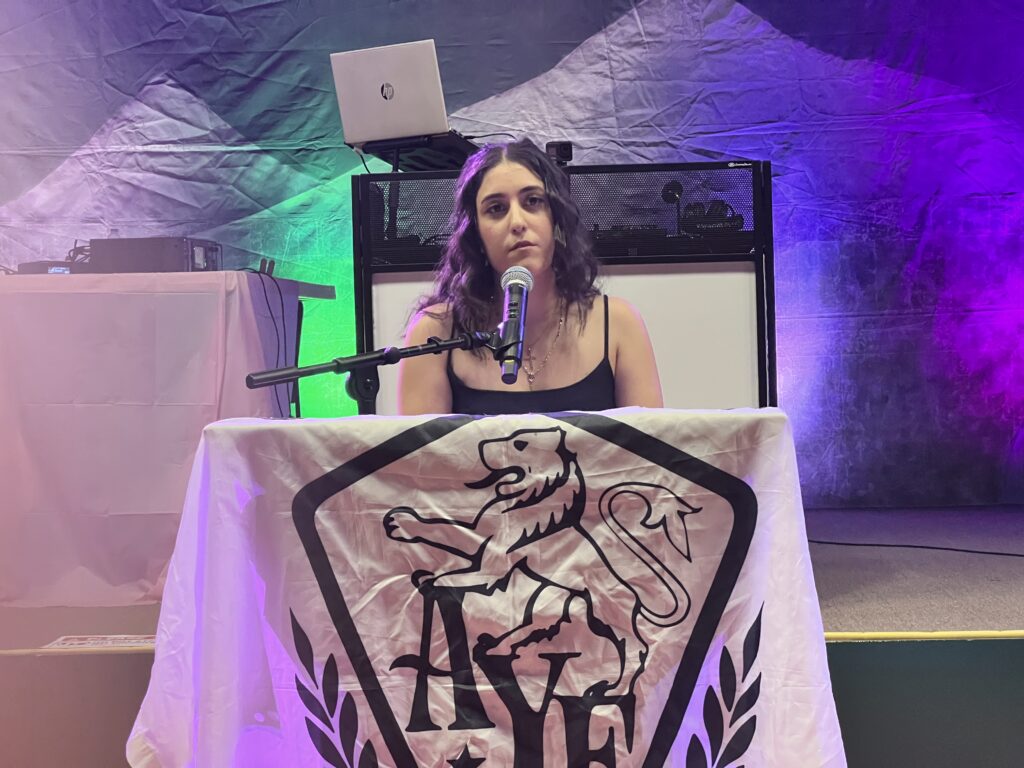 Photo of U. Arpa Shahnazarian delivering her opening remarks at the AYF DC "Ani" Chapters annual May Dance - "The Capital Ball"